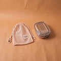 Bento Small 1 i rustfrit stål 18/8 med lys netpose i bomuld fra Yummii Yummii